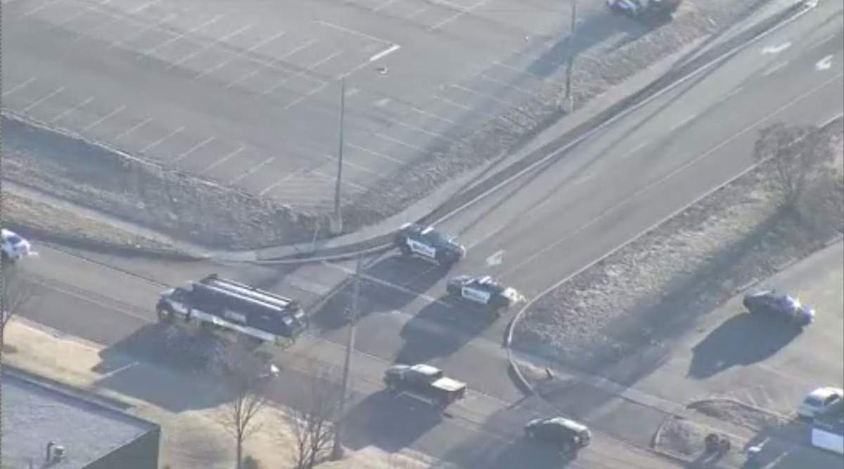 Halton police cruisers block the entrance of Bronte GO Station in Oakville, Ontario Feb. 6, 2024.