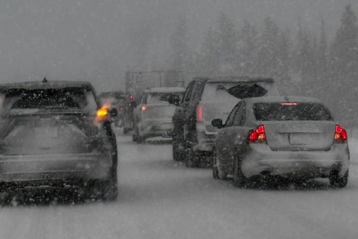 Collision closes Trans-Canada west of Calgary, as snowfall warning issued for the city