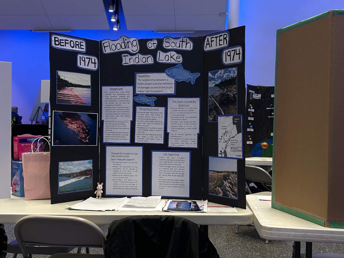 Two students with the Frontier School Division presented a project on the impact of a hydro project on the community of South Indian Lake, in Winnipeg on Feb. 23, 2024.