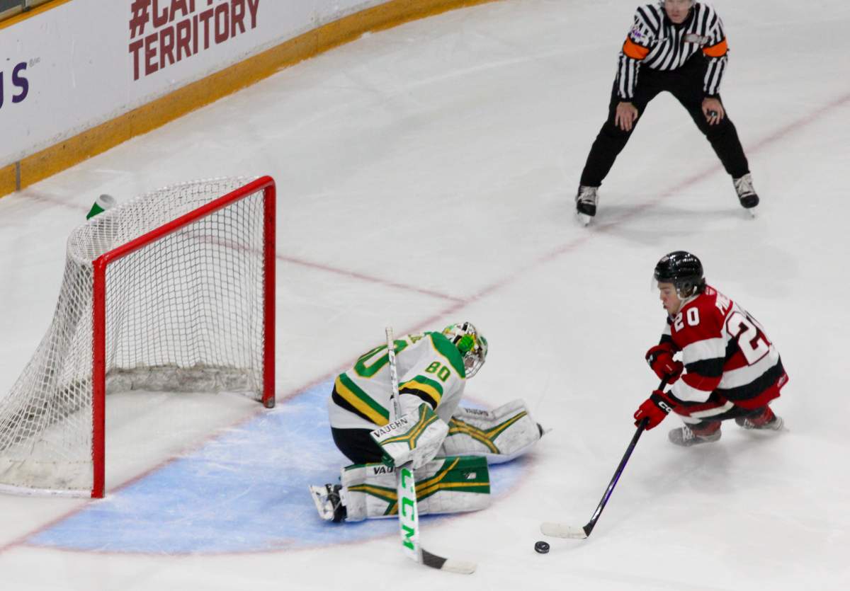 Owen Willmore of the London Knights denies Luca Pinelli of Ottawa in a shootout on Feb. 24, 2024.