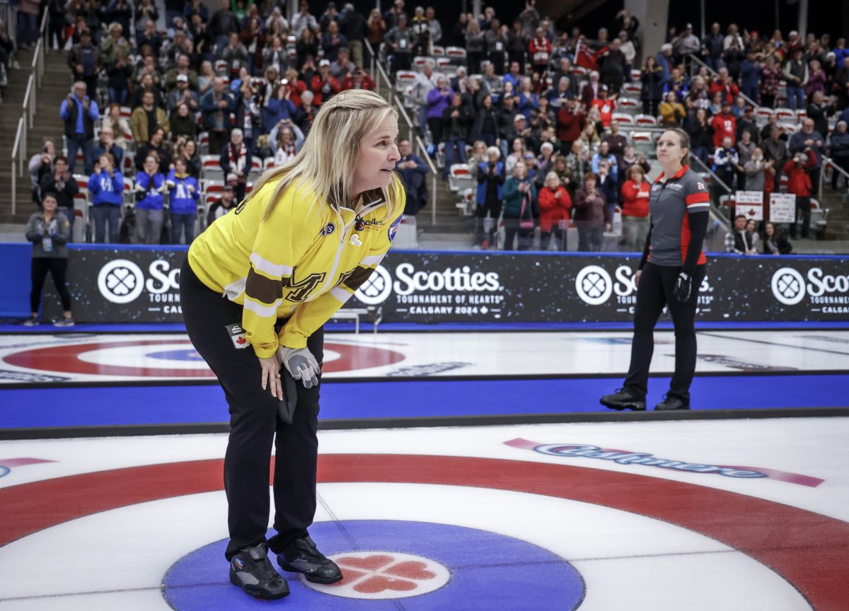 Team Manitoba-Jones skip Jennifer Jones, left, becomes emotional after being defeated by Team Ontario-Homan skip Rachel Homan, right, in the final at the Scotties Tournament of Hearts in Calgary, Sunday, Feb. 25, 2024.