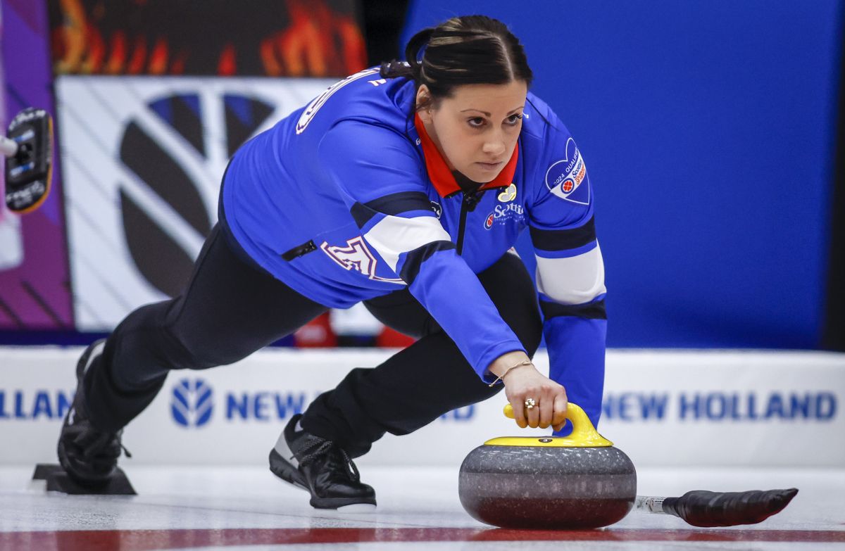 Team Manitoba-Cameron skip Kate Cameron makes a shot as they play Team Ontario–Inglis at the Scotties Tournament of Hearts in Calgary, Monday, Feb. 19, 2024.