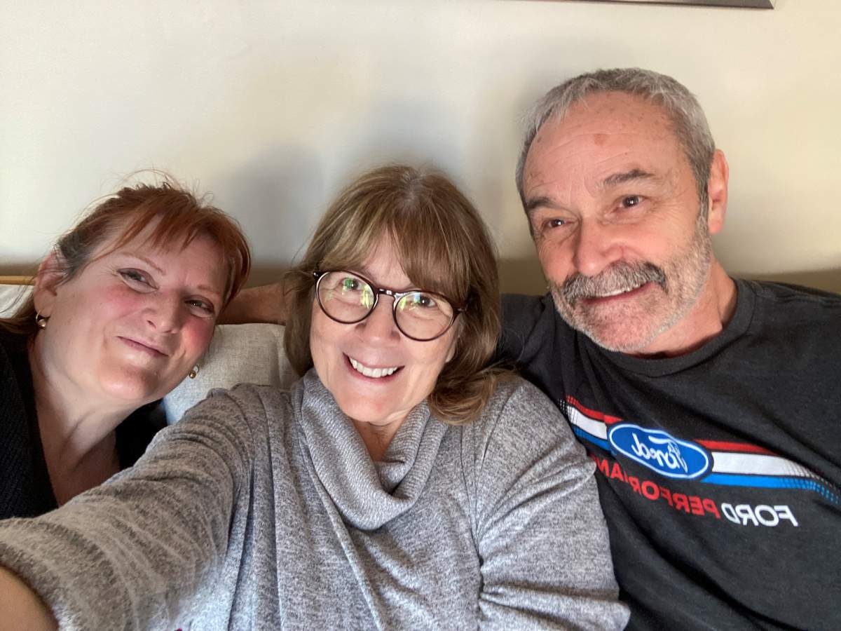 Catherine Wall, Carmen Austria and Brian Perkins take a selfie on the morning they discovered they were $50M winners