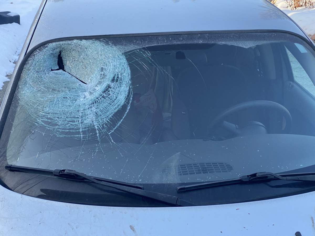 A brick smashed through the windshield of this car in Edmonton on Whitemud Drive at the 53 Avenue overpass on Thursday, Feb. 22, 2024.