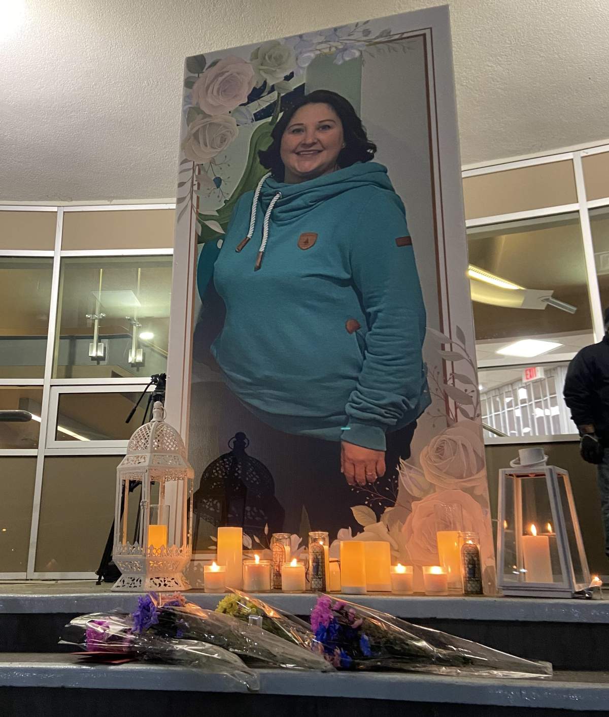 Hundreds of people at a candlelit vigil in Fort Saskatchewan, Alta. for Kassandra Gartner, who was killed in a hit-and-run in Edmonton on Feb. 24, 2024.