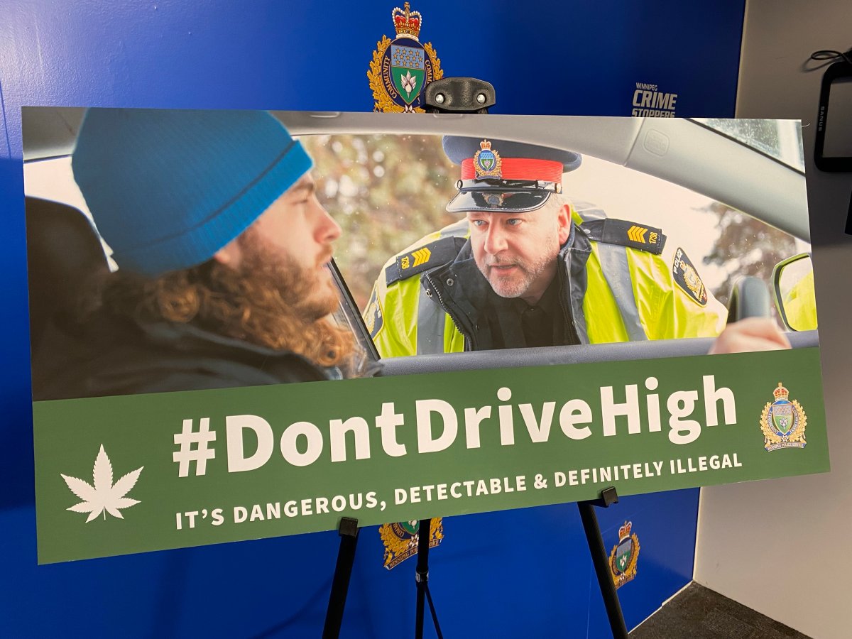 Advertising for the police awareness campaign against drug-impaired driving is seen at a press conference.