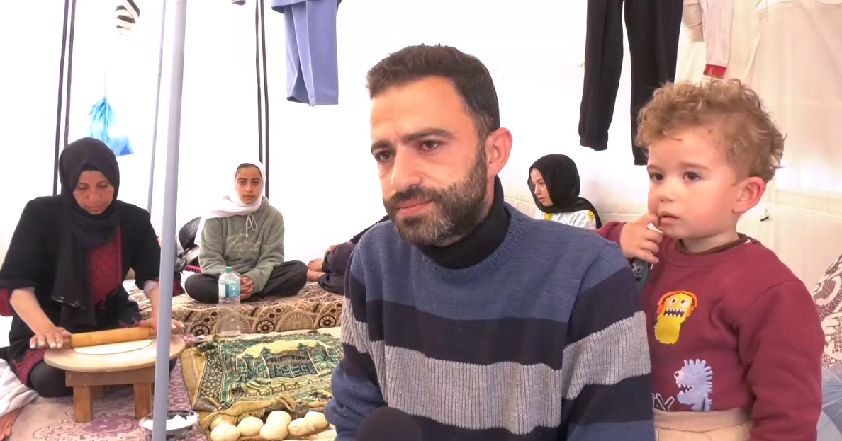 Nedal Zaqout with in his family’s tent in Rafah.