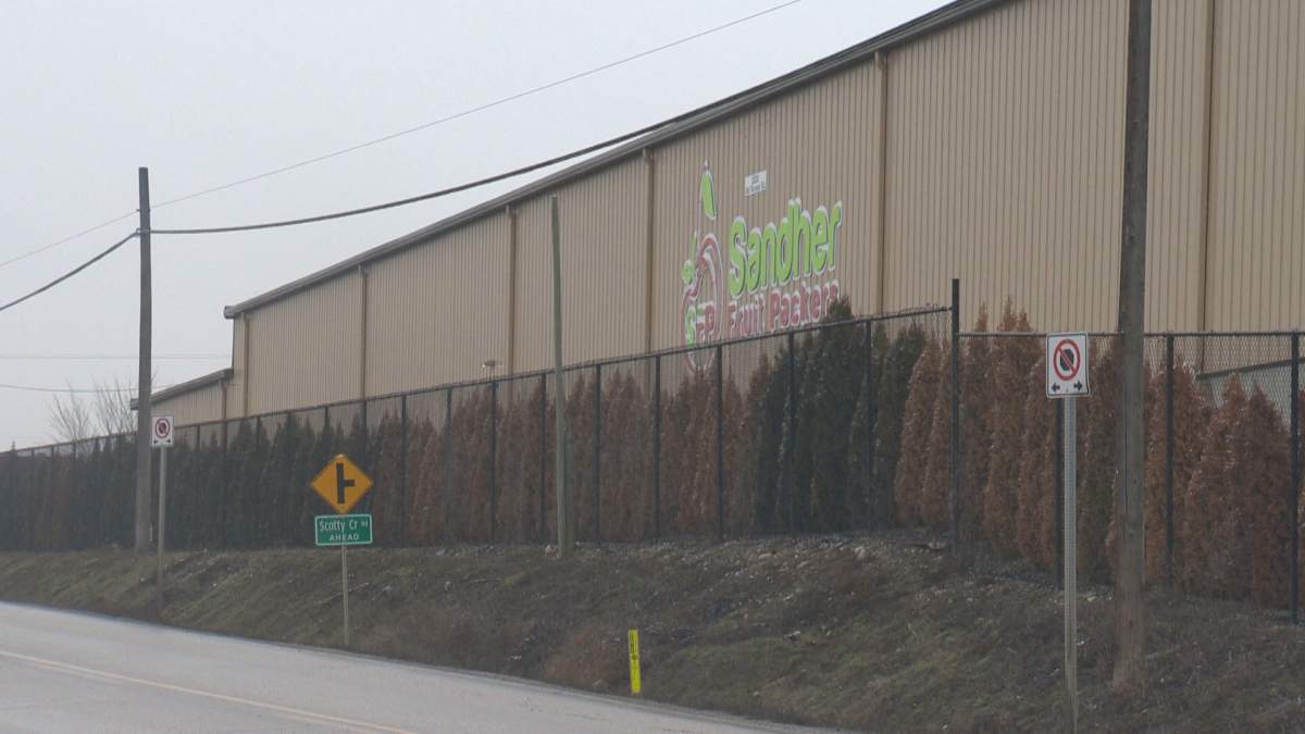 The outside of a fruit packing plant.