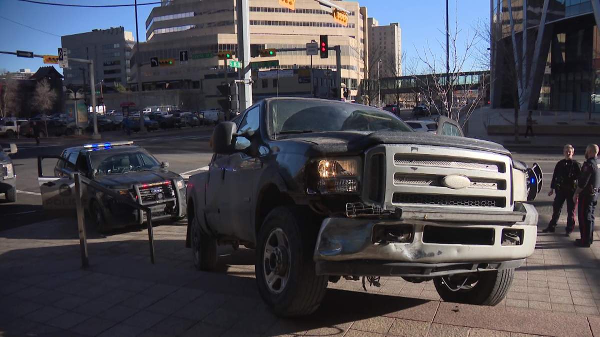 A vehicle crashed into Calgary's Suncor building Friday, Feb. 2, 2024.