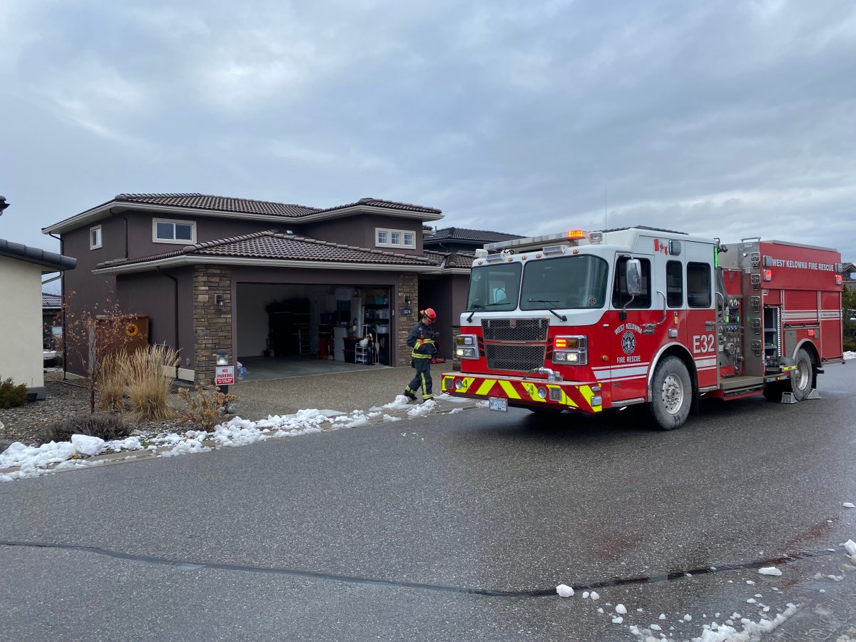 A fire truck in front of a West Kelowna home.