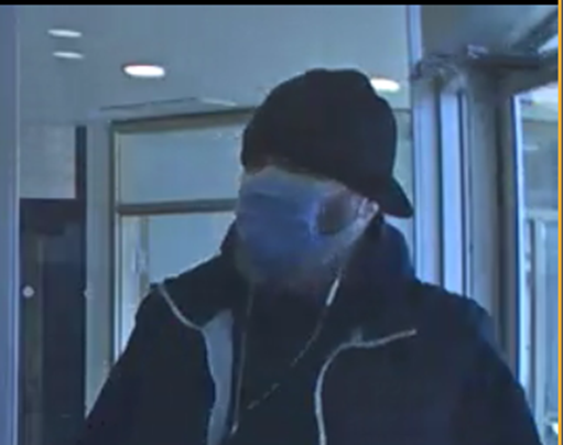 The Calgary Police Service is looking for a man who is believed to be involved in a bank robbery on Saturday morning.