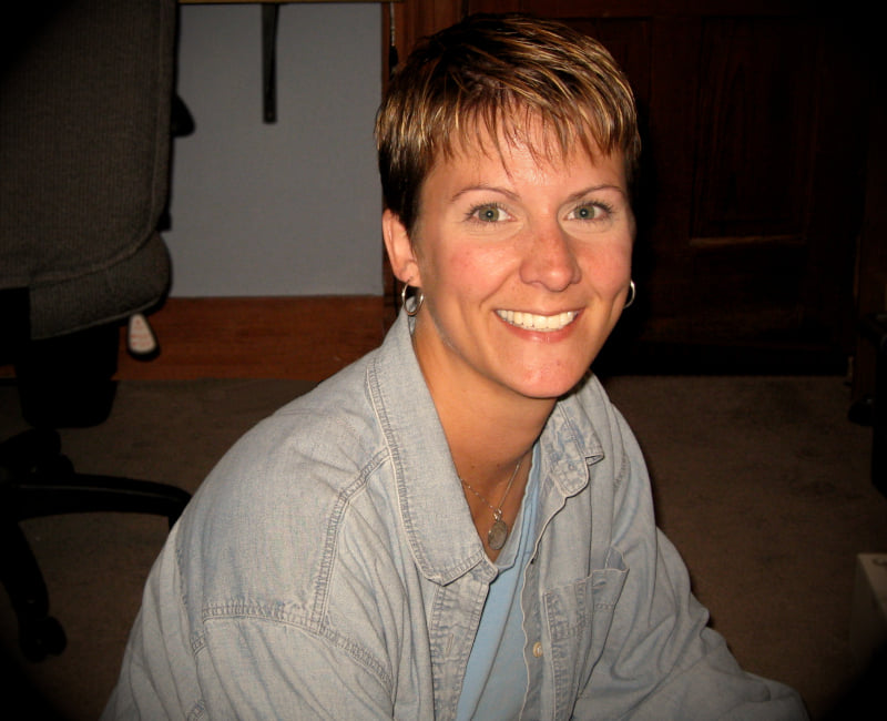 A photo of Cari Farver smiling.