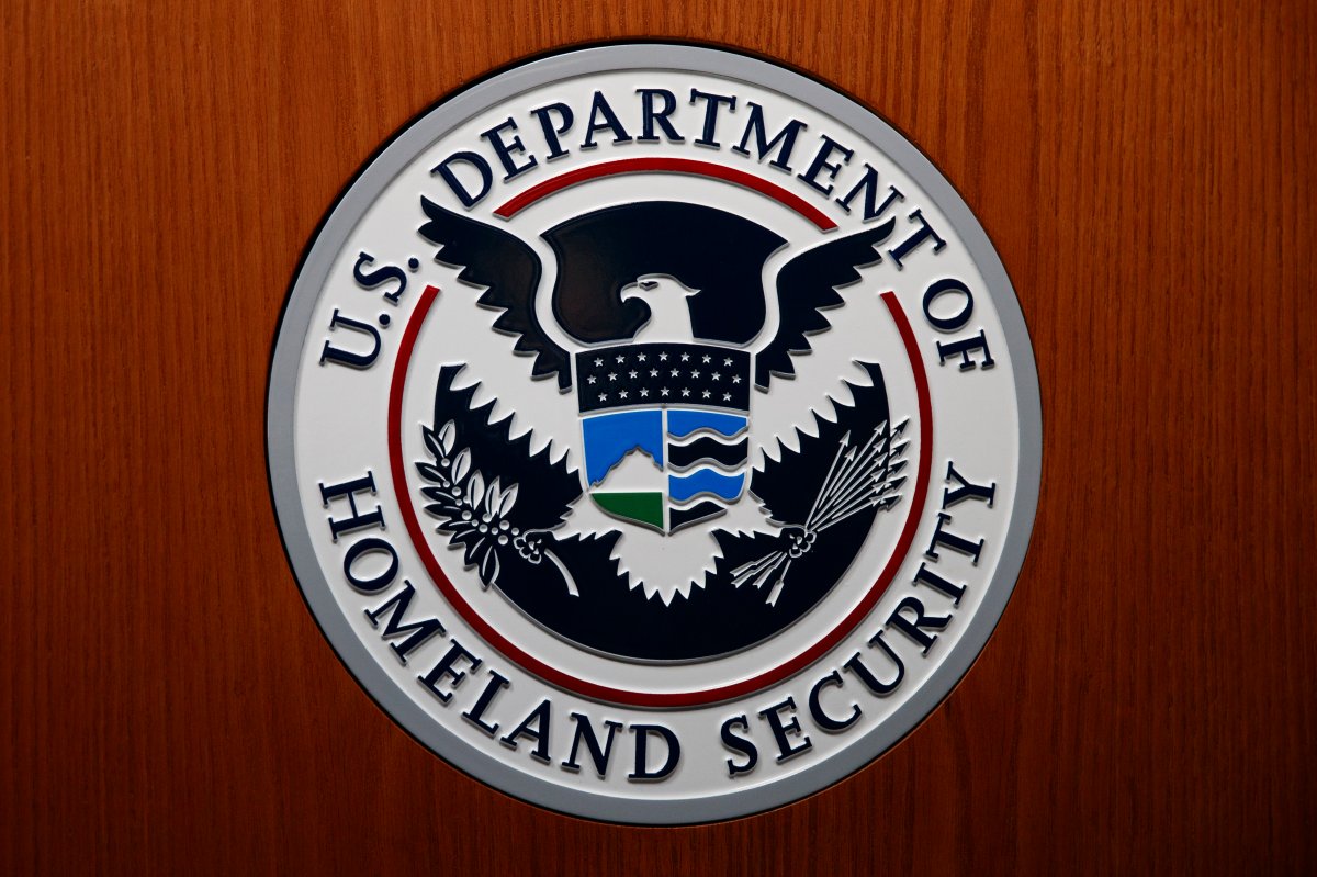 FILE - In this June 28, 2019, file photo the Department of Homeland Security (DHS) seal is seen during a news conference in Washington.  