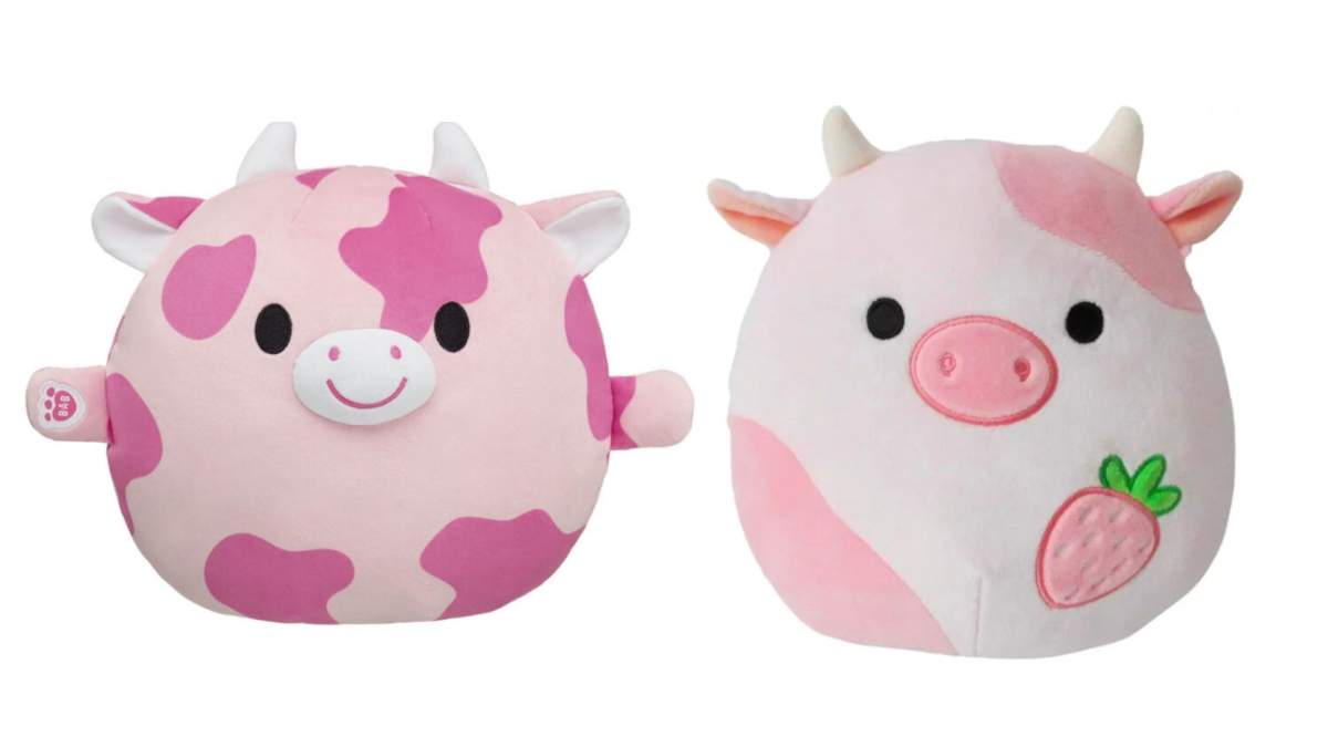 On the left is a Skoosherz pink cow. On the right is a Squishmallows pink cow.