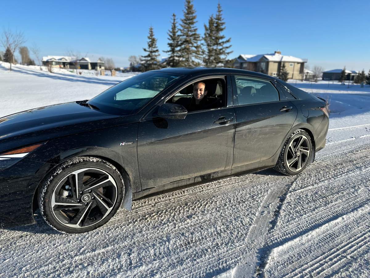 Kailee Gray driving new vehicle