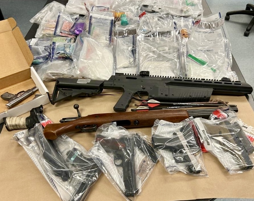 Police in Lindsay, Ont., seized firearms and drugs at two addresses on Feb. 13, 2024. Six people were arrested.