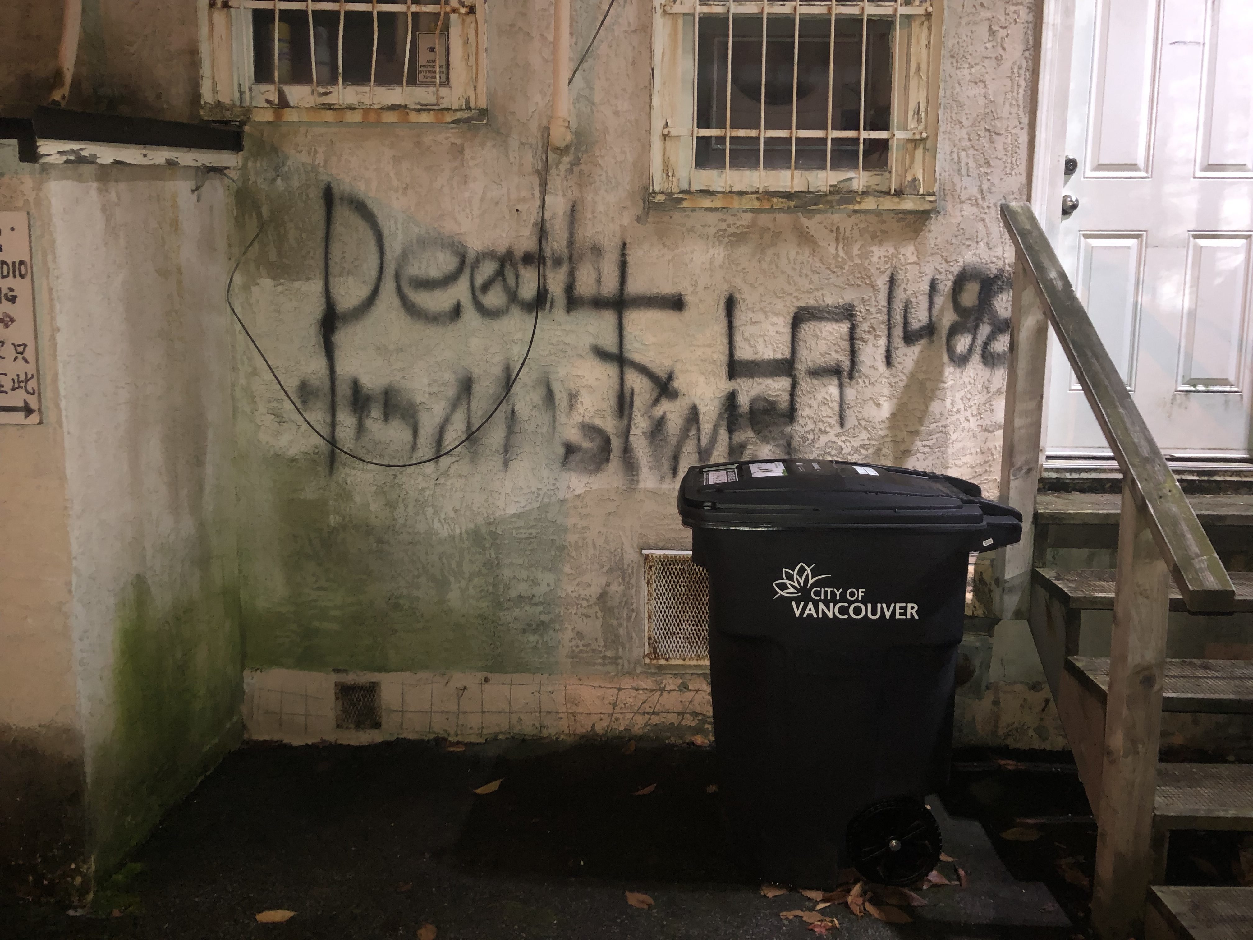 The graffiti Marcus Stiller found in the parking area behind his restaurant.