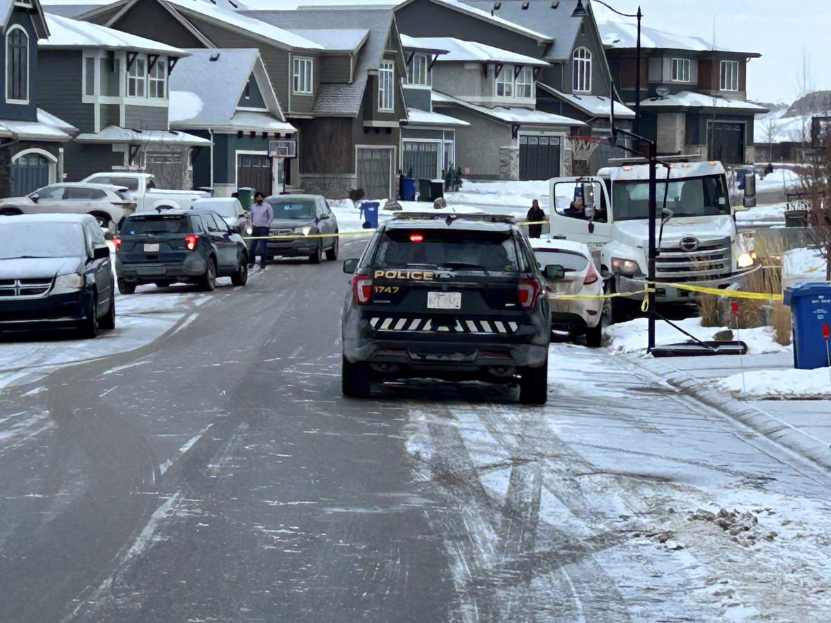 A major police presence in northwest Calgary along Sage Meadows Way Thursday, Feb. 15, 2024.