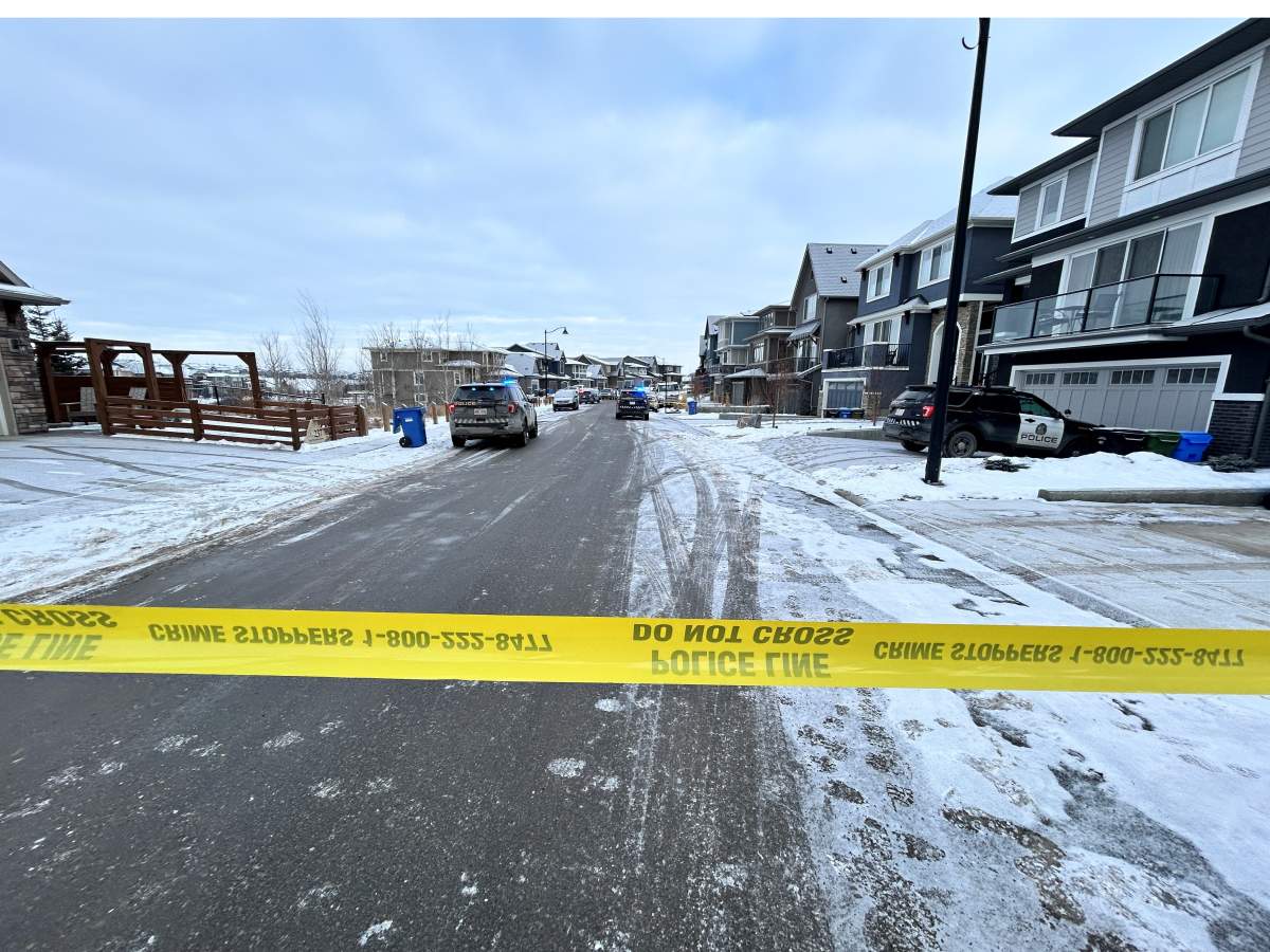 A major police presence in northwest Calgary along Sage Meadows Way Thursday, Feb. 15, 2024.