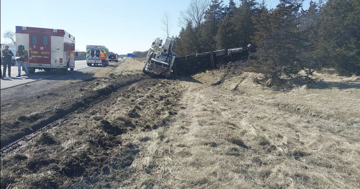 No serious injuries are reported after a tow truck carrying a heavy load went off the highway and into a ditch on Hwy 401 east of Belleville Monday.