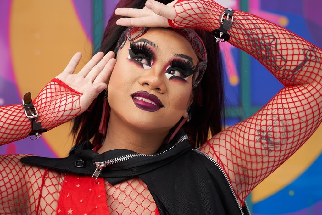 Ruby Chopstix is the Rainbow Resource Centre's first drag artist in residence. She poses for a portrait following her drag performance at The Forks in Winnipeg, Man., on Feb. 11, 2024.