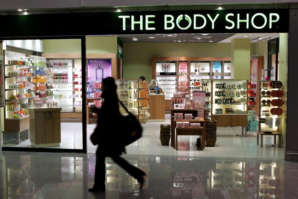 The Body Shop International Limited filed for administration in the U.K. and announced plans to close dozens of stores there last month. A woman passes a Body Shop cosmetics store in this file photo.