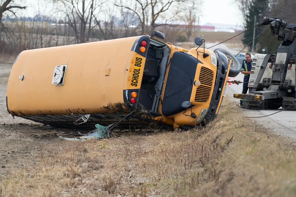 School bus driver charged after 5 children injured in rollover near Woodstock, Ont.