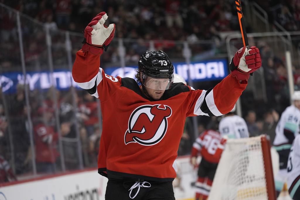 New Jersey Devils' Tyler Toffoli reacts after Jack Hughes scores during the second period of an NHL hockey game against the Seattle Kraken in Newark, N.J., Monday, Feb. 12, 2024. The Winnipeg Jets have acquired veteran winger Toffoli from the New Jersey Devils in exchange for draft picks. THE CANADIAN PRESS/AP/Seth Wenig.
