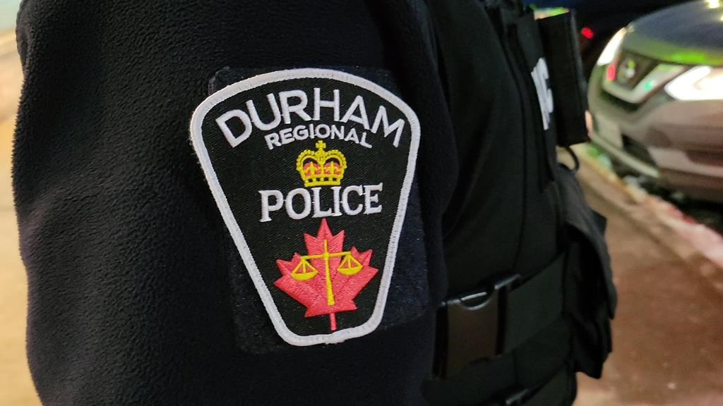 A man faces charges of indecent exposure in Whitby. A Durham Regional Police officer's logo in Bowmanville, Ont., on Feb. 28, 2023. THE CANADIAN PRESS/Doug Ives.