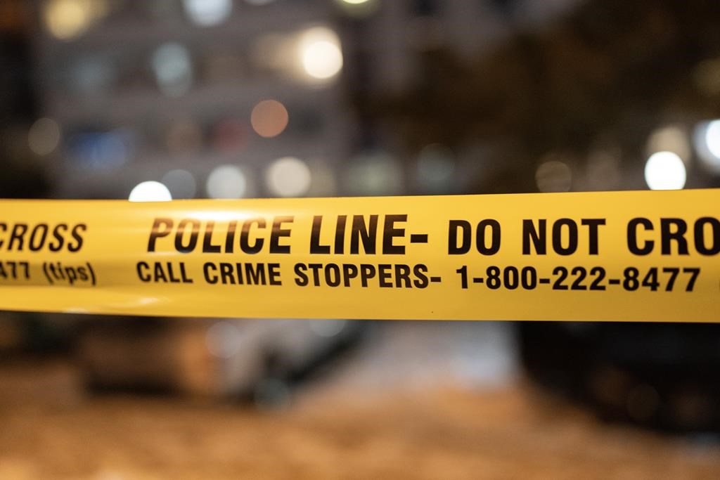 Police tape cordons off a crime scene in Toronto on Saturday, Jan. 14, 2023.