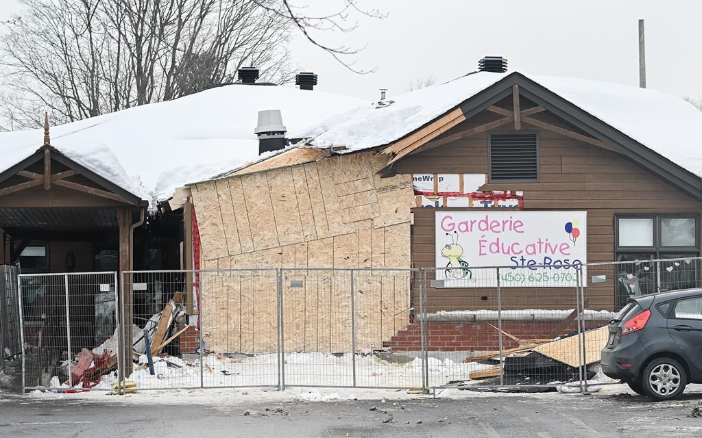 A daycare is boarded up in the aftermath of a bus crash outside the centre.
