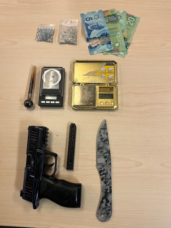 Police have charged a 34-year-old from Kingston after they say a suspect was seen selling drugs in the city's downtown Monday.