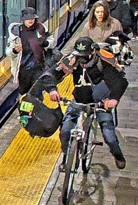 Three suspects wanted in an attack at the ground level Churchill platform of the Valley Line LRT in Edmonton, Alta. on Saturday, Feb. 24, 2024.