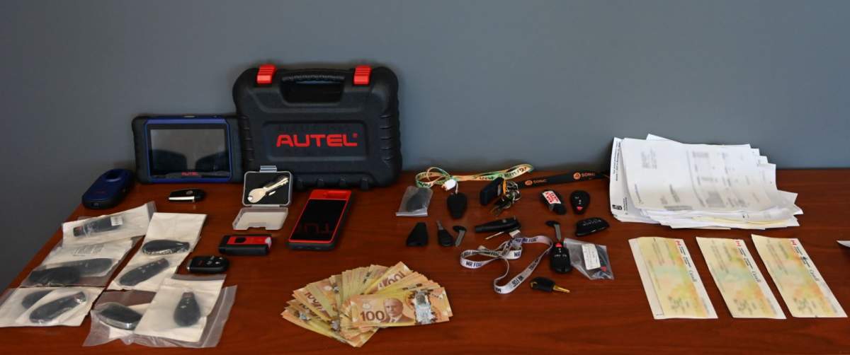 RCMP executed a search warrant at a home in Edmonton seizing vehicle key programmers and counterfeit cash.