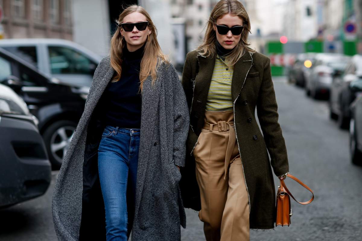 Street style, Tine Andrea and Annabel Rosendahl arriving at Carven Fall-Winter 2018-2019 show held at Lycee Camille See in Paris, France, on March 1, 2018.