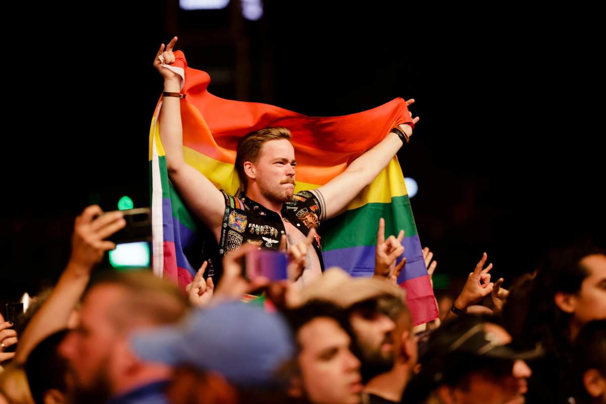 Metal fans celebrate the performance of the British heavy metal band “Judas Priest” at WOA – Wacken Open Air in wacken, Germany, Thursday, Aug. 4, 2022.