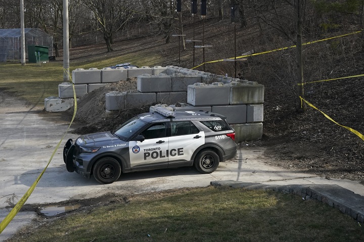 The scene where two police officers were injured while chasing a shooting suspect is pictured in Toronto, Tuesday, March 12, 2024.