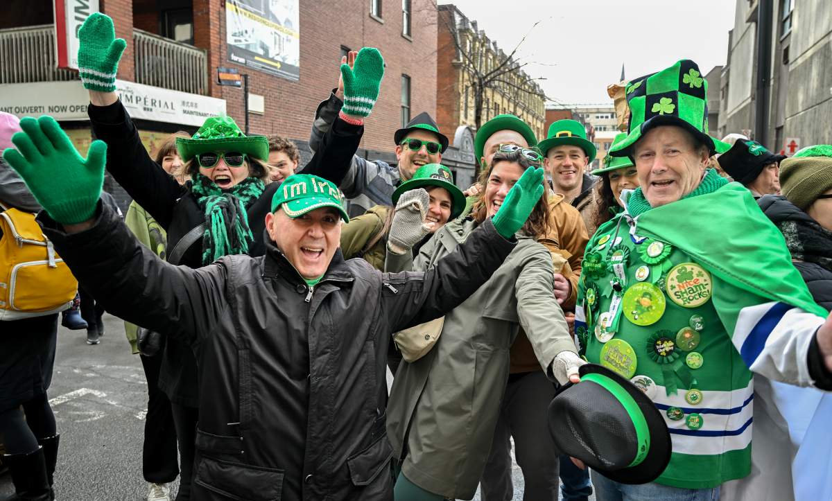 Members of the crowd cheer as they enjoy the St. Patrick’s Day parade in Montreal, Sunday, March 17, 2024. THE CANADIAN PRESS/Graham Hughes