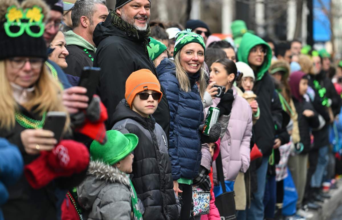 Members of the crowd look on during the St. Patrick’s Day parade in Montreal, Sunday, March 17, 2024. THE CANADIAN PRESS/Graham Hughes