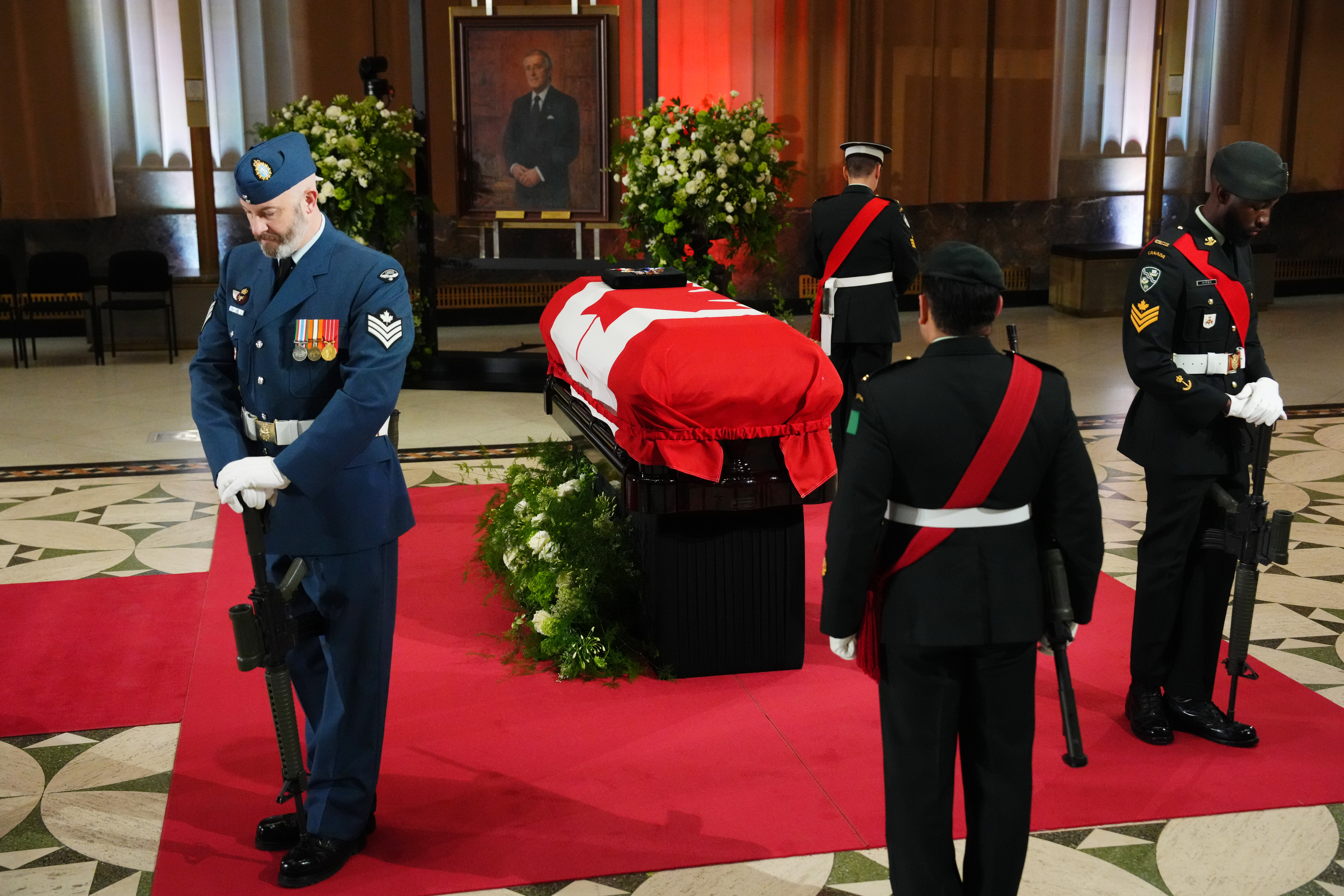 Brian Mulroney's flag-draped casket lies in state in Ottawa.