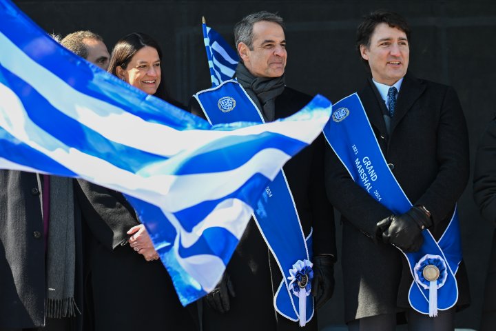 Justin Trudeau and Greek Prime Minister Mitsotakis walk in Montreal independence parade