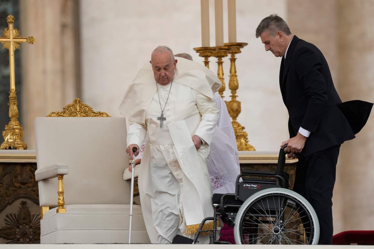 Pope Francis leaves at the altar after celebrating Easter mass in St. Peter’s Square at the Vatican, Sunday, March 31, 2024.