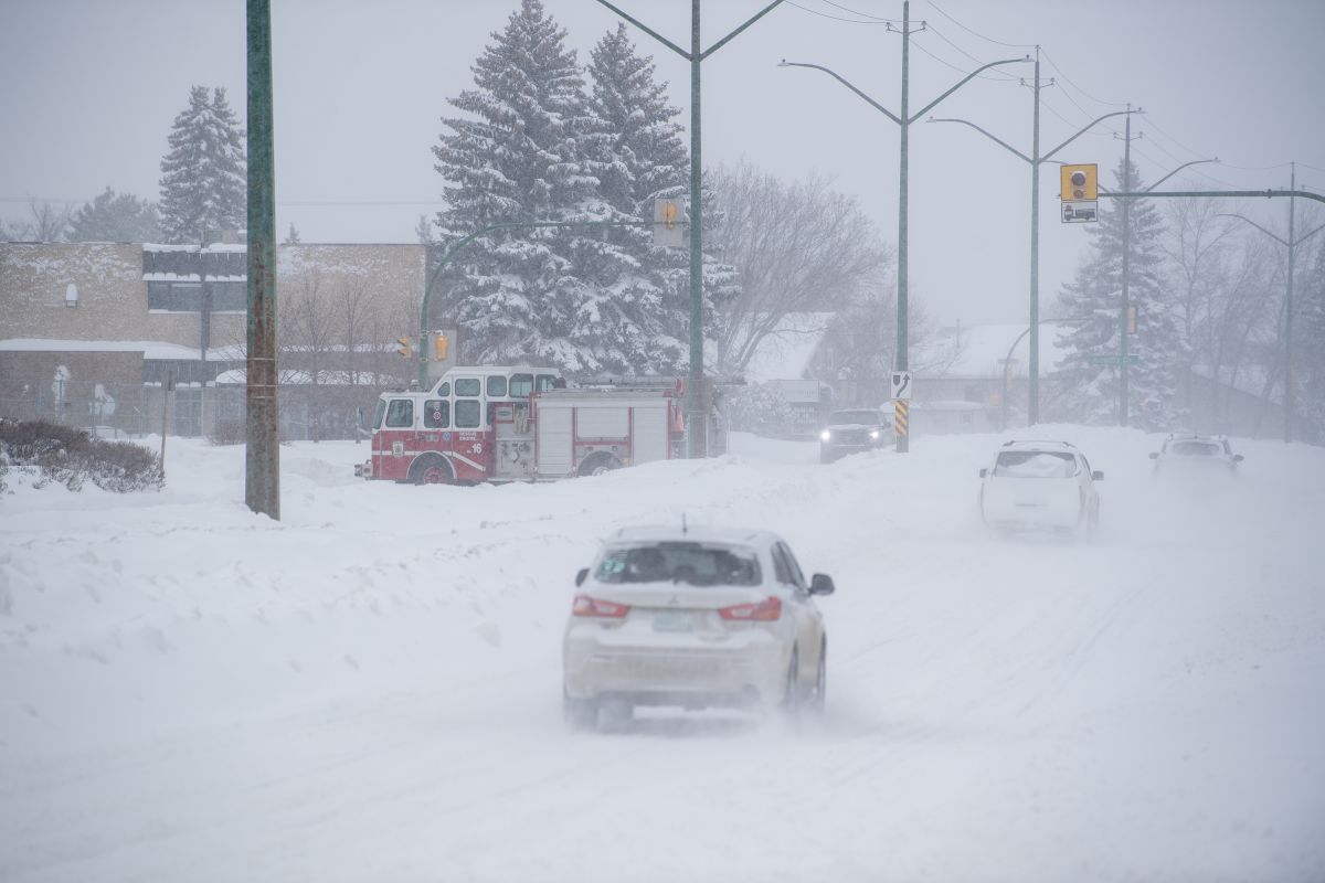 A Saskatoon Fire Department engine during a Winter Storm Warning in Saskatoon, Sask., Sunday, March 3, 2024. The city saw large amount of snow and strong winds.