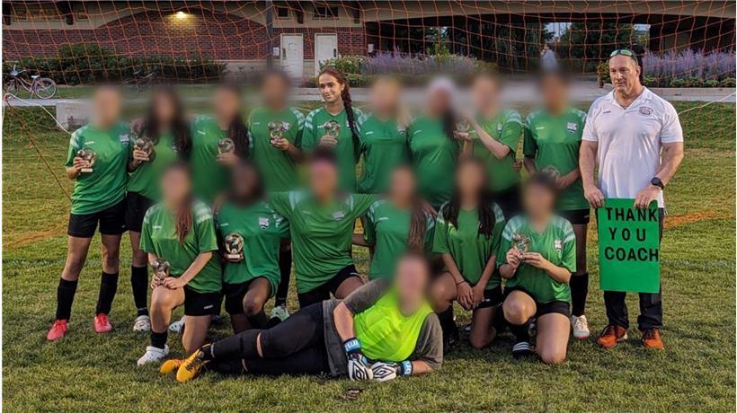 An undated photo of 16-year-old Mahek Warikoo with her soccer team and coach.