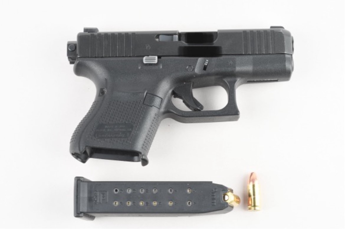 A loaded Glock 9mm handgun and the keys to the stolen vehicle were allegedly found during an arrest.