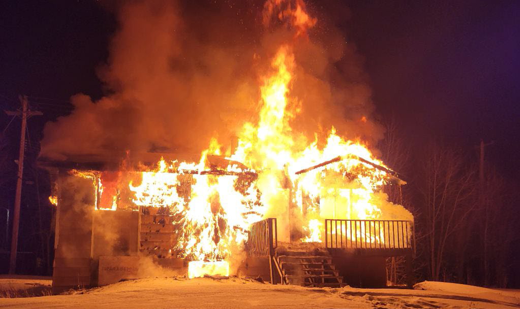 Manitoba RCMP are looking for two youth suspects connected to this fire in Gods Lake Narrows.