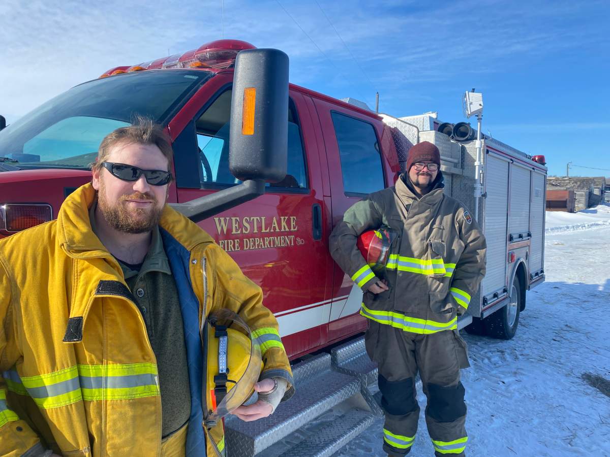 Ian Kotelko (left) and the Westlake Fire Department Chief James Taylor (right).