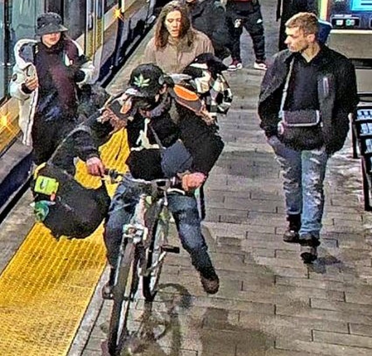 From left to right: The fourth, third, fifth and and second of six suspects wanted in connection with an assault on Edmonton's Churchill LRT platform on Feb. 24, 2024.