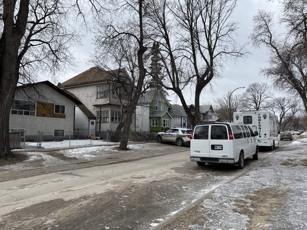 Police at the scene of what they are deeming a homicide on Manitoba Avenue.