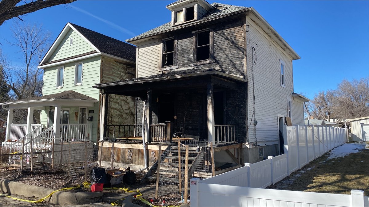 The Saturday fire at a house in Moose Jaw also caused damaged to a nearby home.